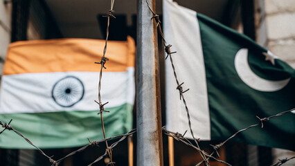 india and pakistan, barbed wire around, symbolizing war and conflict, AI