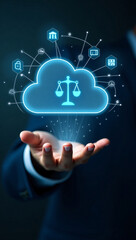Digital cloud with scales of justice hovering over a hand, illustrating legal technology and online data security
