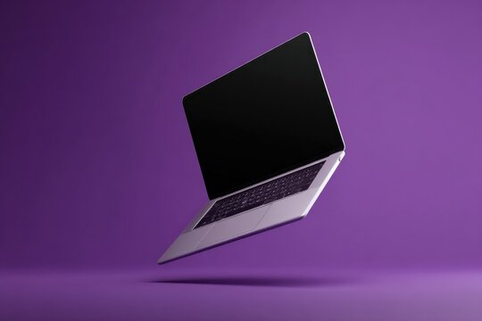 A silver laptop computer floats against a vibrant purple background, its screen dark and inviting, suggesting concepts of technology, innovation, and modern design. : Generative AI