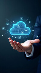 Businessman holding a digital cloud in his hand, symbolizing cloud computing and data storage. The cloud is glowing blue and is interconnected with various digital icons