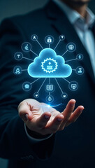 A person holding a cloud-shaped digital data icon, representing information technology 