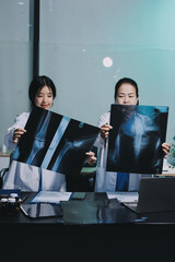 Team of professional doctors having meeting in office