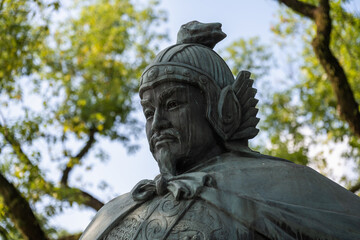 Naklejka premium Close-up of a Bronze Statue of a Historical Figure
