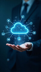 Fototapeta premium A man in a suit holding a glowing cloud that represents cloud computing technology. A visionary image of technology that inspires