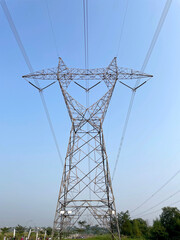 High voltage cable power pole. High voltage iron tower with electric cables on clear sky background