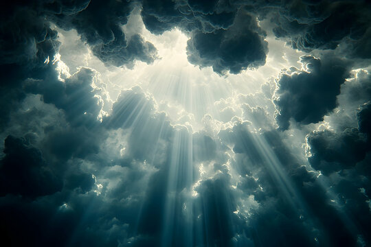 Sunbeams breaking through dark clouds dramatic light effect