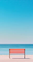 Fototapeta premium Coral bench on beach against vibrant blue sky