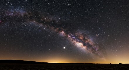Majestic Milky Way Galaxy Over Dark Landscape A Night Sky Panorama Showcasing a Dazzling Display of Stars Nebulae and Cosmic Dust Perfect for Illustrating Astronomy Science