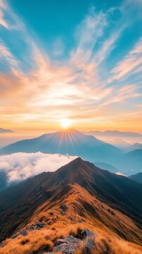 A breathtaking view of a mountain peak at sunrise, with clouds gently rolling in the valley below. The vibrant colors create a serene and inspiring atmosphere.