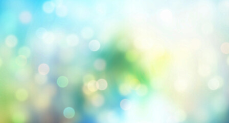 Obraz premium ethereal spring blur with soft green and blue bokeh suggesting light through foliage and early morning atmosphere
