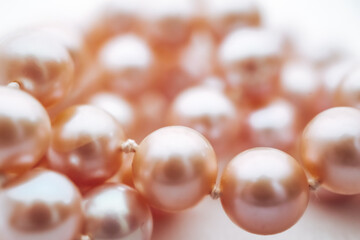Pink Cultured Pearls Close-up on Elegant Background