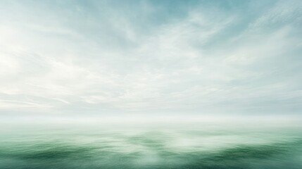 Obraz premium Serene waterscape hazy sky and tranquil ocean