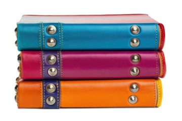 Stack of three vibrant leather-bound journals with metallic accents