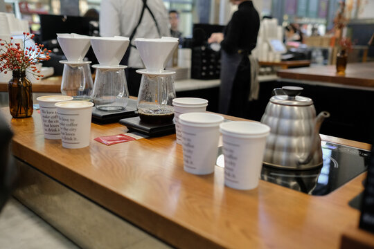 Coffee drip and paper cups