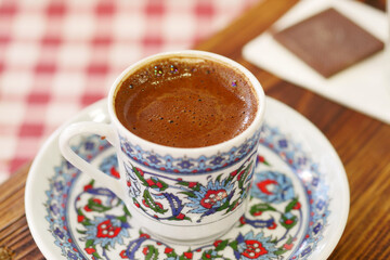 Traditional turkish coffee served in a decorative cup
