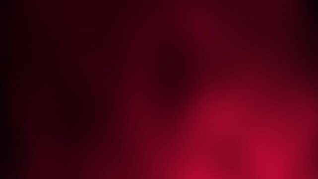 A smooth gradient of dark red and maroon colors blending softly across the image, Abstract texture Gradient motion Background animation.