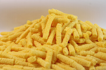 Corn sticks snack and white background