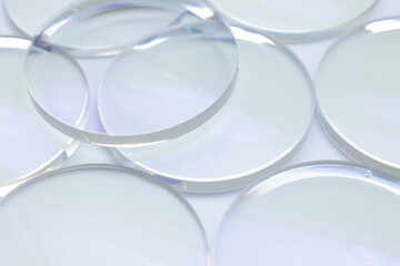 Closeup of a lens on white background, glasses lenses 