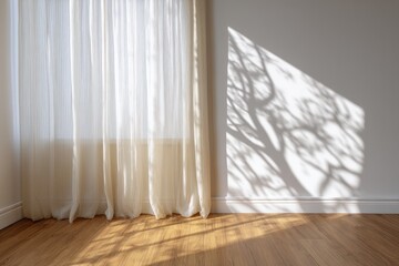 Soft shadows of tree branches dance on a sunlit wall.