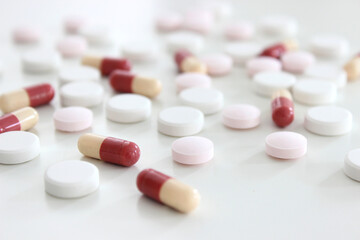 Drug tablet and capsule isolated on the white background
