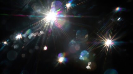 Obraz premium Bright starbursts against a dark night sky.