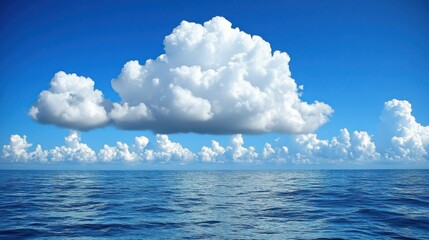 White Cumulus Cloud Over Blue Ocean Under a Clear Blue Sky During Daytime