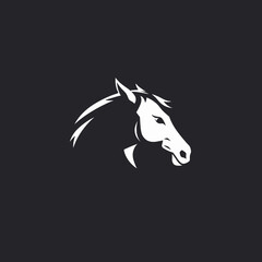 Fototapeta premium Stylized white horse head logo on a dark background