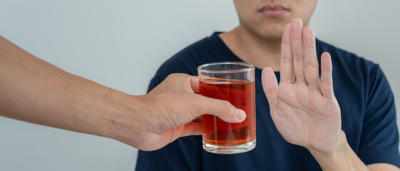 man refuses say no and avoid to drink an alcohol whiskey, stopping hand sign male, alcoholism...