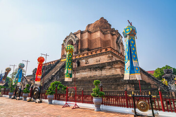 Lanna lantern and Prayer flags tung Hang or Northern traditional flag hang on sand pagoda in the Wat Chedi Luang temple for Songkran Festival is celebrated in a traditional New Year Day in Chiang Mai