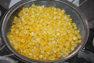 Corn kernels that have been boiled. Corn-based dishes
