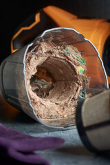 collected and clogged dirt, fibers and debris in vacuum cleaner, used without cleaning or...