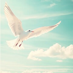 Fototapeta premium A bird flying freely in a bright blue sky dotted with soft clouds, the wings spread wide, symbolizing freedom and tranquility in nature.