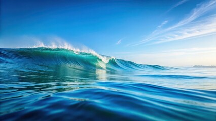 Fototapeta premium Tranquil ocean waves gently rolling on a serene light blue background, blue sky, serene, blue sky,serene, ocean waves