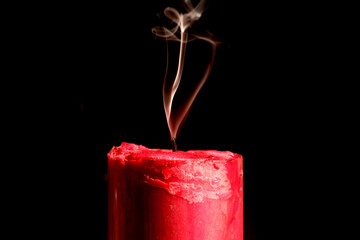 Extinguished Candle with Smoke Rising from the Wick
