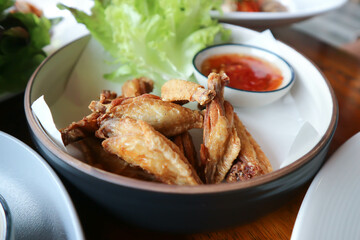 chicken wings or deep fried chicken , fried chicken and sauce