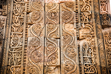 Stone carving detail of the Qutub Minar, New Delhi, India