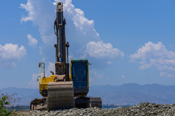 Beach Maintenance Work with Excavator