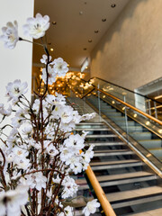 Decorative cherry blossoms inside modern building