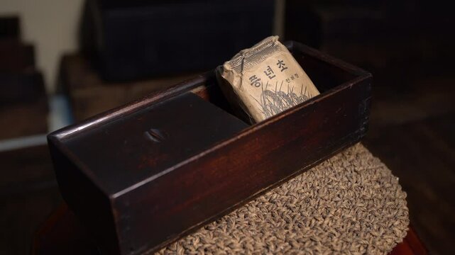Traditional Korean tobacco box and old cigarettes &ndash; vintage artifact