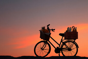 Obraz premium 015-043-223-u8969375333_Silhouette_of_a_bike_with_a_basket_of_groceries.__c07da2dd-2ea3-4825-ab60-95c42f9dfe4d_2