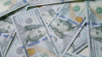CloseUp Picture of Stacks of Hundred Dollar Bills, Showcasing Financial Abundance and Assets