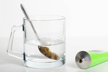 Tube with medicinal paste on herbs used in urology. Treatment of infectious inflammatory diseases of the urinary tract, close-up