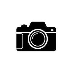 A simple black silhouette icon of a digital camera (DSLR or mirrorless style) viewed from the front, highlighting the lens. Ideal for photography or media-related themes.
