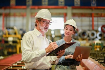 woman engineer assistant secretary in helmet inspection check control heavy machine construction...