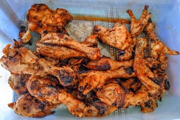 From an overhead perspective, a photo captures a plastic container holding piles of boiled,...