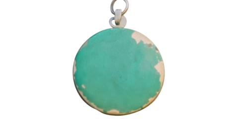 Worn, Round Green Pendant with Silver Ring, cut out transparent