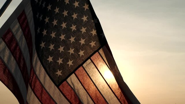 Memorial Day USA. Remember and Honor. Silhouettes of American flag waving on background of beautiful sunset or sunrise for honoring, mourning USA military. Memorial Day, Happy Holiday American Concept