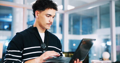 Business, coding and man with programming, laptop and software update with app testing. Person,...