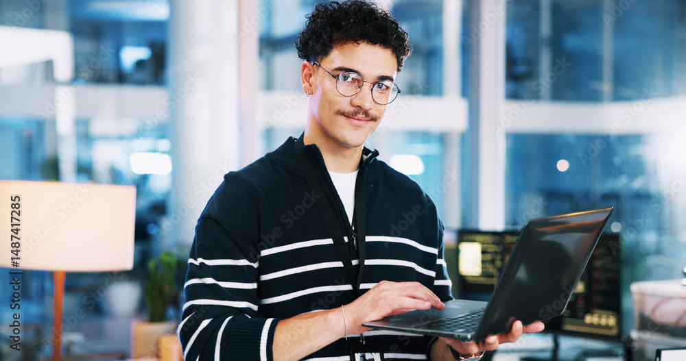 Poster Portrait, man and developer with laptop in office for programming, coding software and server update. Male person, online and testing pc of IT research, website application and troubleshooting system