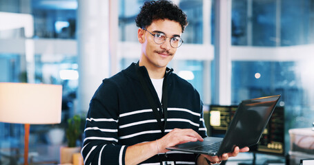 Portrait, man and developer with laptop in office for programming, coding software and server...